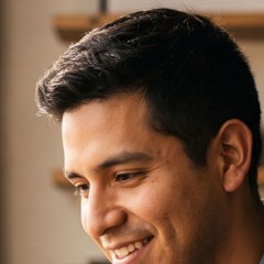 A field teammate smiling at his phone (Illustration)